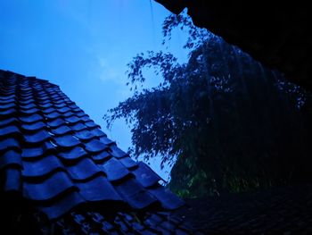 Low angle view of building against blue sky