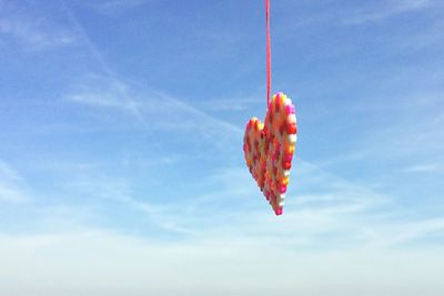 Low angle view of kite against sky