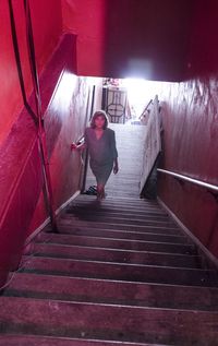 Woman standing on steps