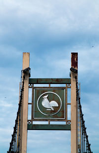 Low angle view of clock tower against sky