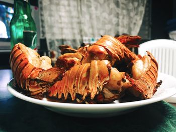 Close-up of seafood in plate on table