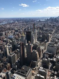 Aerial view of cityscape against sky