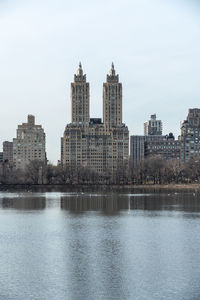 Buildings in city against sky