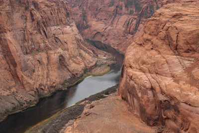 Colorado river amidst horseshoe bend and canyons