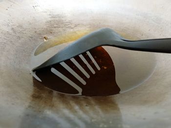 High angle view of fork on table