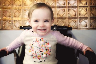 Portrait of cute girl at home