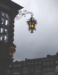 Low angle view of illuminated buildings against sky