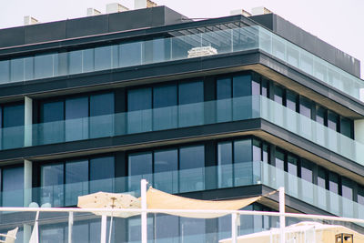 Low angle view of modern building against clear sky