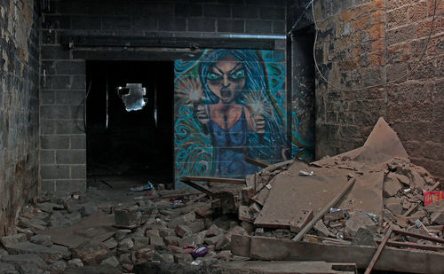 Graffiti on wall of abandoned building