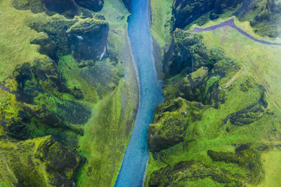 High angle view of rocks and sea