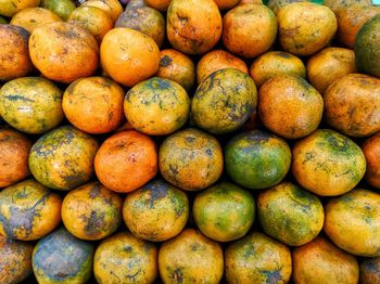 Full frame shot of oranges in market