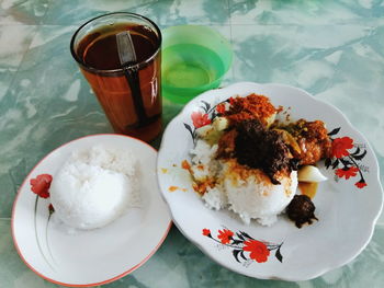 High angle view of breakfast served on table