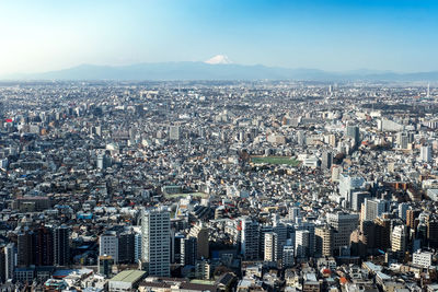 Mountain fuji with cityscape of tokyo skylines, taken from tokyo metropolitan government building
