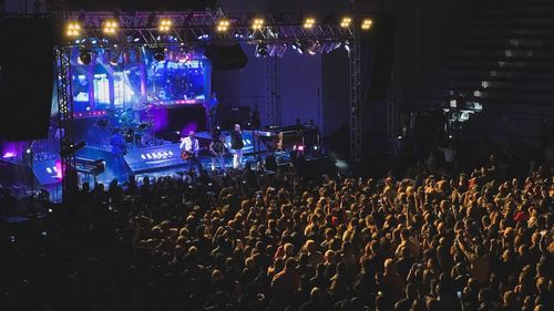 Crowd at music concert at night