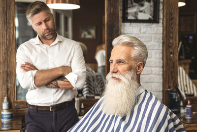 Portrait of senior man working at home