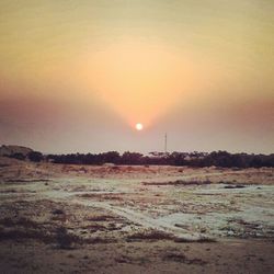 Scenic view of landscape at sunset