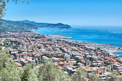 View of cityscape with sea in background