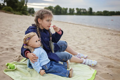 Women sitting on beach