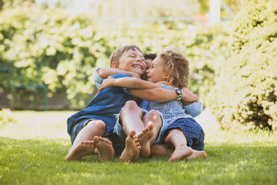 Mother and baby girl on grass