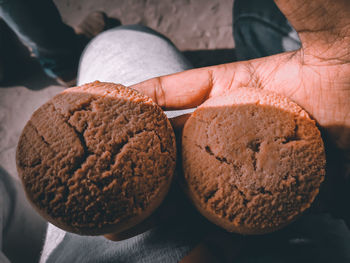 Close-up of hand holding cookies