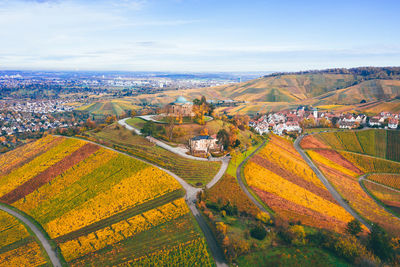 High angle view of field against sky during autumn