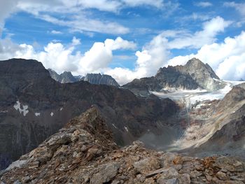 Scenic view of snowcapped mountains against sky