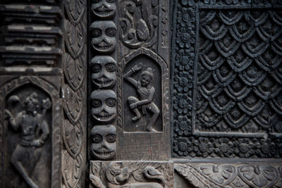 Carvings on wall in temple