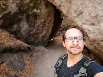 Portrait of young man looking away