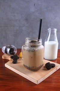 Close-up of drink in glass jar on table