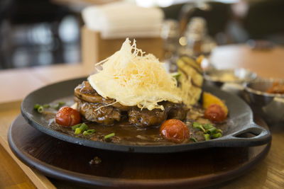 Close-up of food served on table