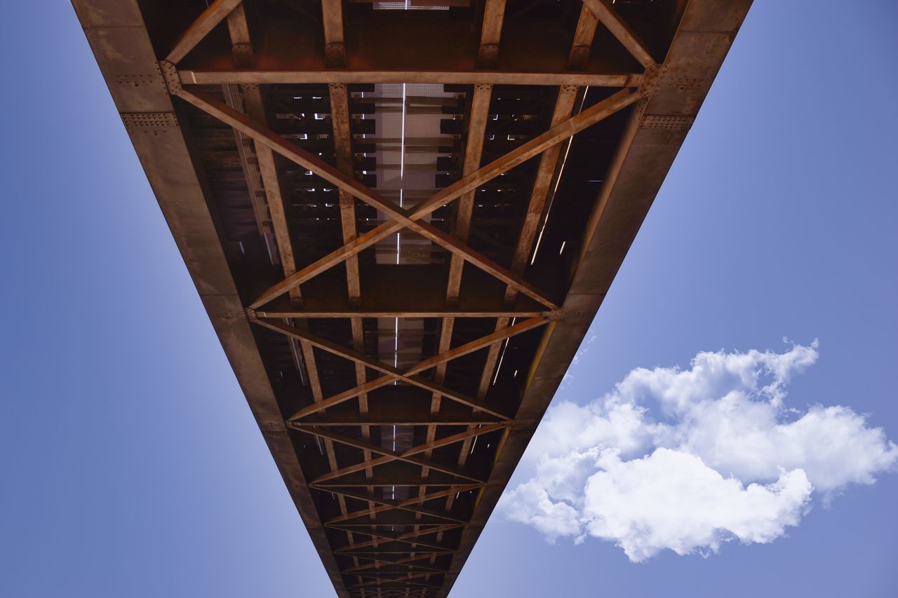 LOW ANGLE VIEW OF TOWER BRIDGE AGAINST SKY