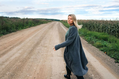 Young woman walking at countryside