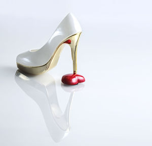 Close-up of ice cream over white background