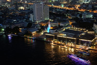 High angle view of illuminated cityscape at night