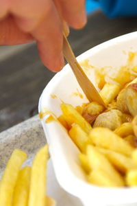 Close-up of person holding food