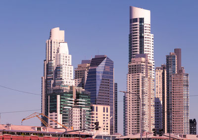 Panoramic view of the skyscrapers of the financial district. blue sky as background.