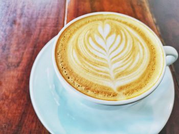 Close-up of cappuccino on table