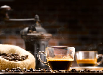Close-up of coffee cup on table