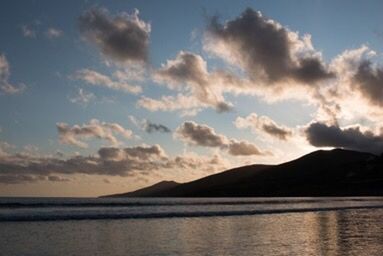 Scenic view of mountains at sunset