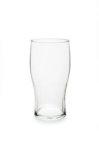 Close-up of empty glass against white background