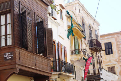 Low angle view of buildings against clear sky