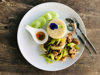 High angle view of meal served in plate on table