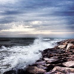 Waves splashing on rocks