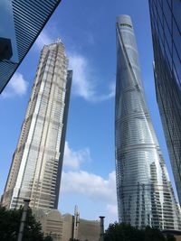 Low angle view of modern buildings against sky