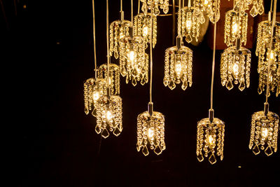 Low angle view of illuminated chandelier