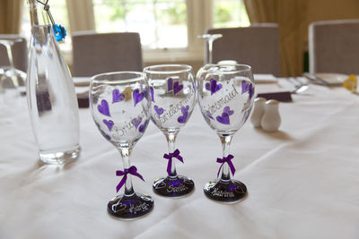 Close-up of empty wineglasses on dining table in restaurant