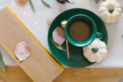 High angle view of coffee cup on table