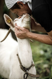 Side view of man with dog