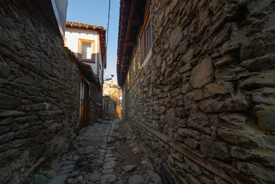 Narrow alley amidst buildings