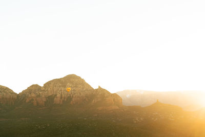 Scenic view of mountains against clear sky